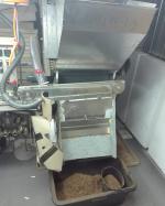 Na zdjęciu maszyna do produkcji papierosów.